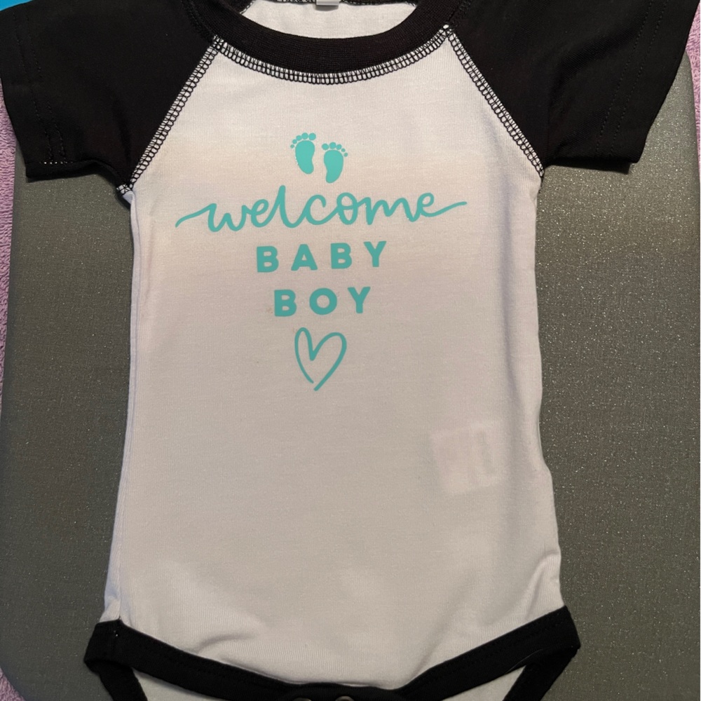 Cricut homemade baby onesie.